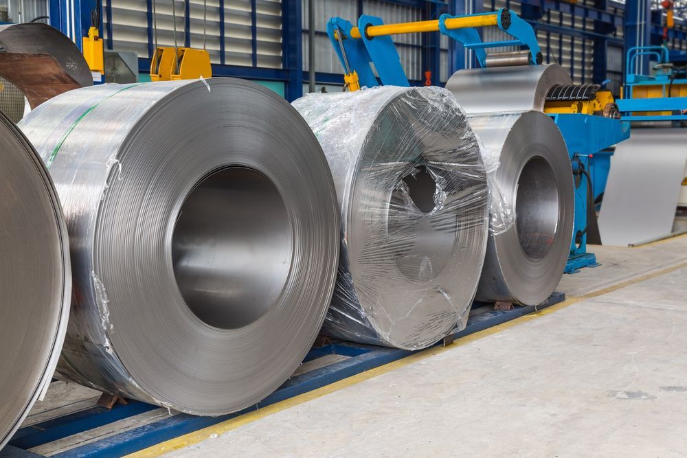 Large Rolls of Shiny Metal, Likely Steel — Rob Powell Plumbing Pty Ltd in Coraki, NSW