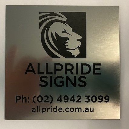 A machine is cutting a piece of blue plastic.