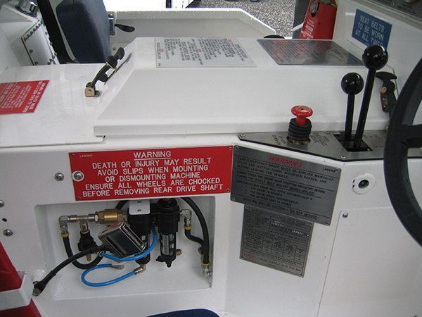 A warning sign on the side of a boat