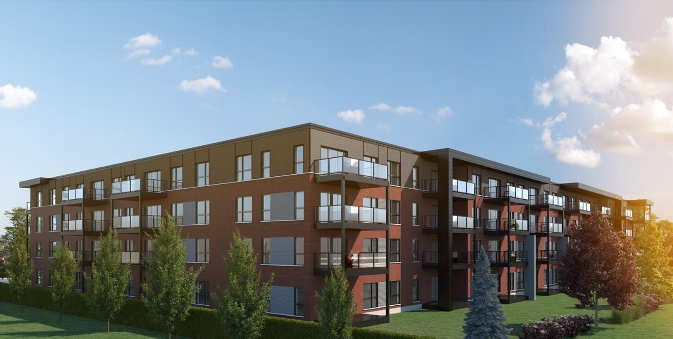 Vue d'artiste d'un grand immeuble entouré d'arbres et d'herbe.