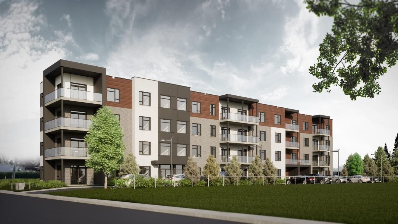 Une vue d'artiste d'un grand immeuble d'appartements.