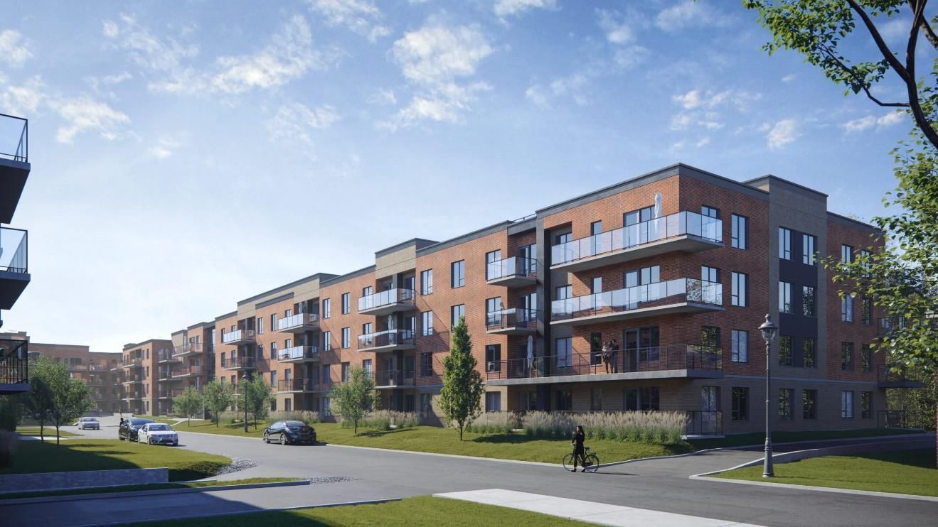 Vue d'artiste d'un grand immeuble avec balcons.