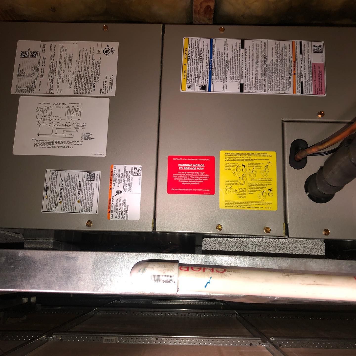 A gray box with a red sticker that says 