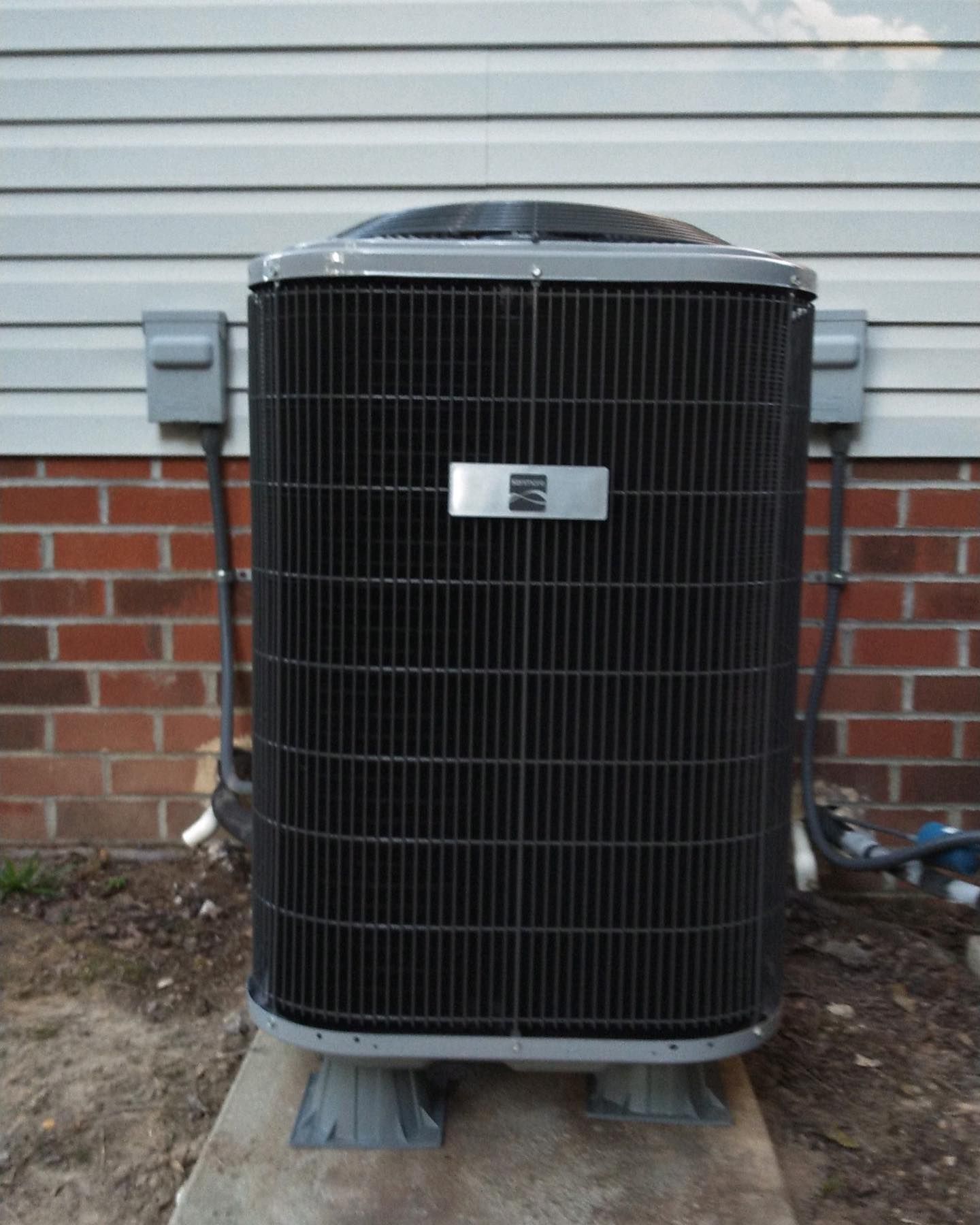 An air conditioner with the letter m on it