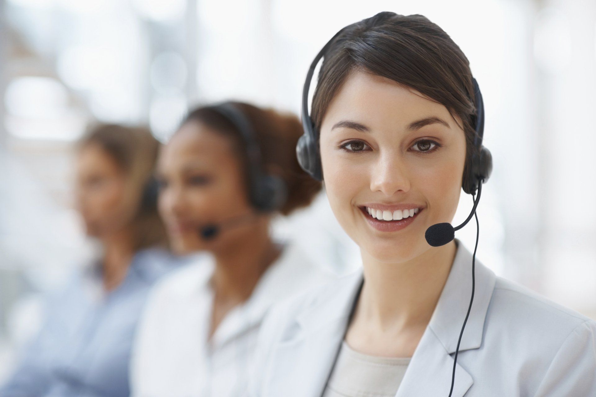 A woman who works for a 24/7 business phone answering service in Madison, WI