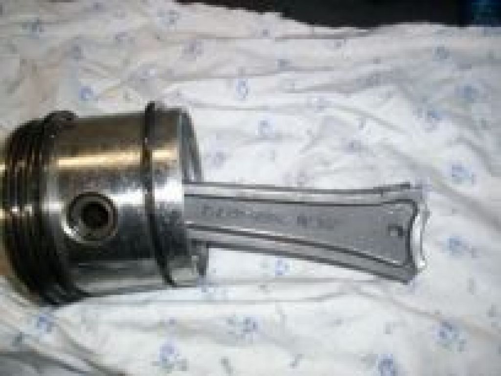 A close up of a valve on a white cloth.