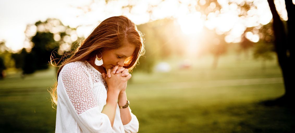 Smiling couple looking to the side.