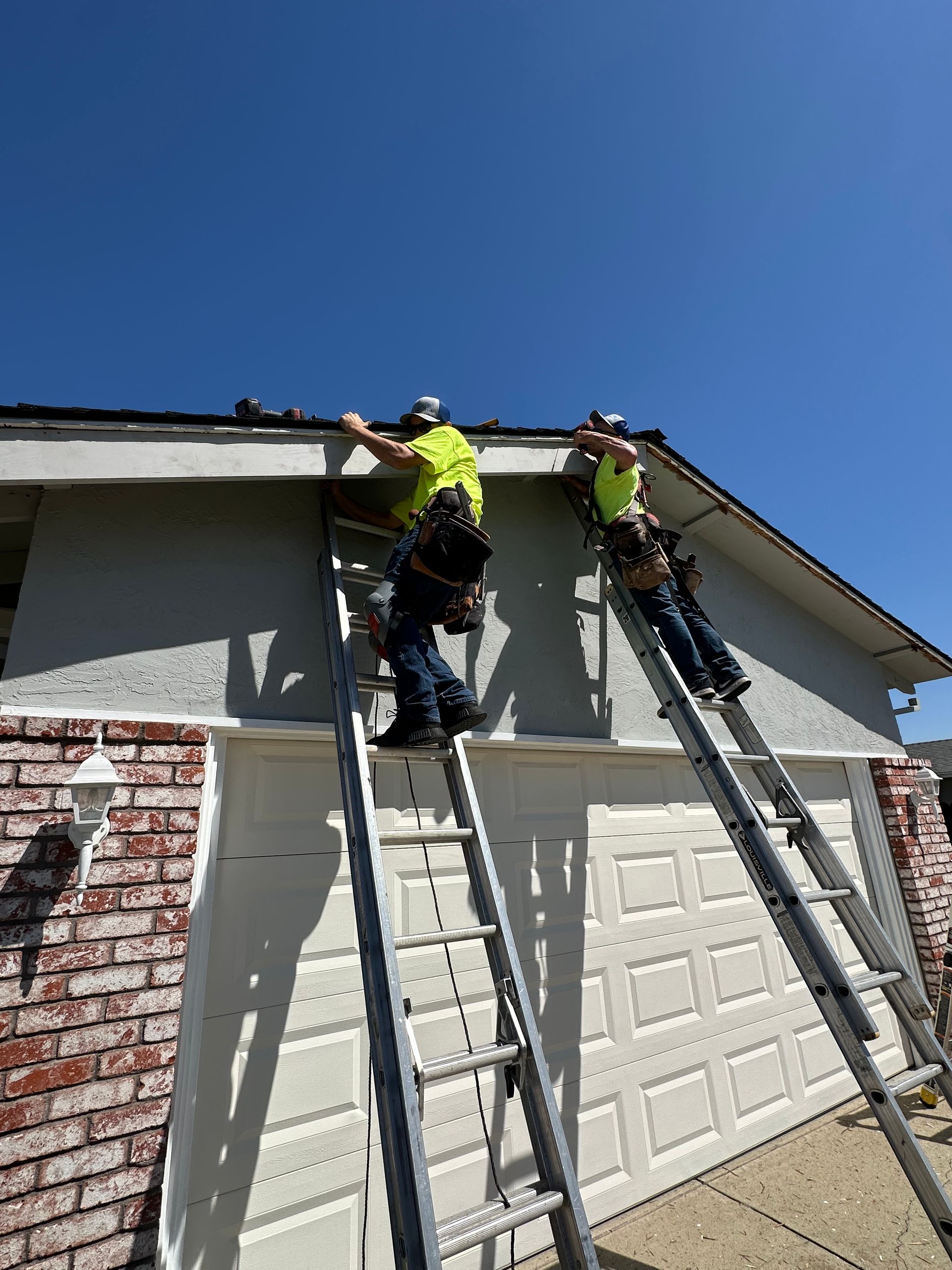 gutter installation using ladders