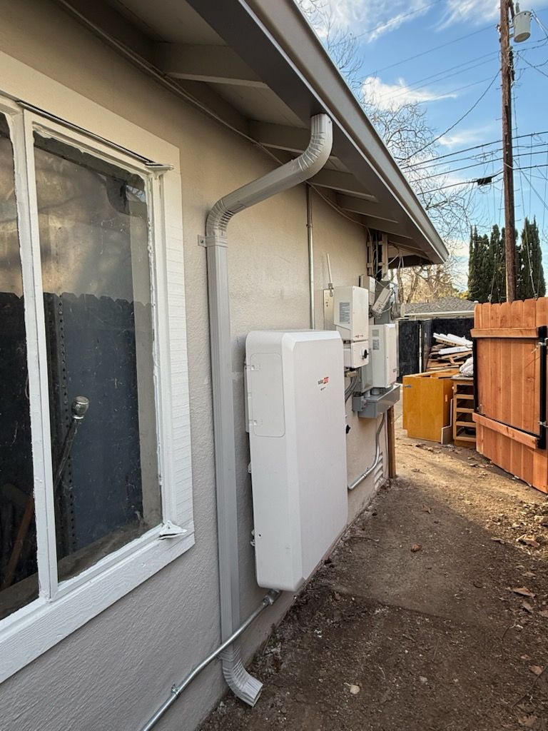downspout around electrical box