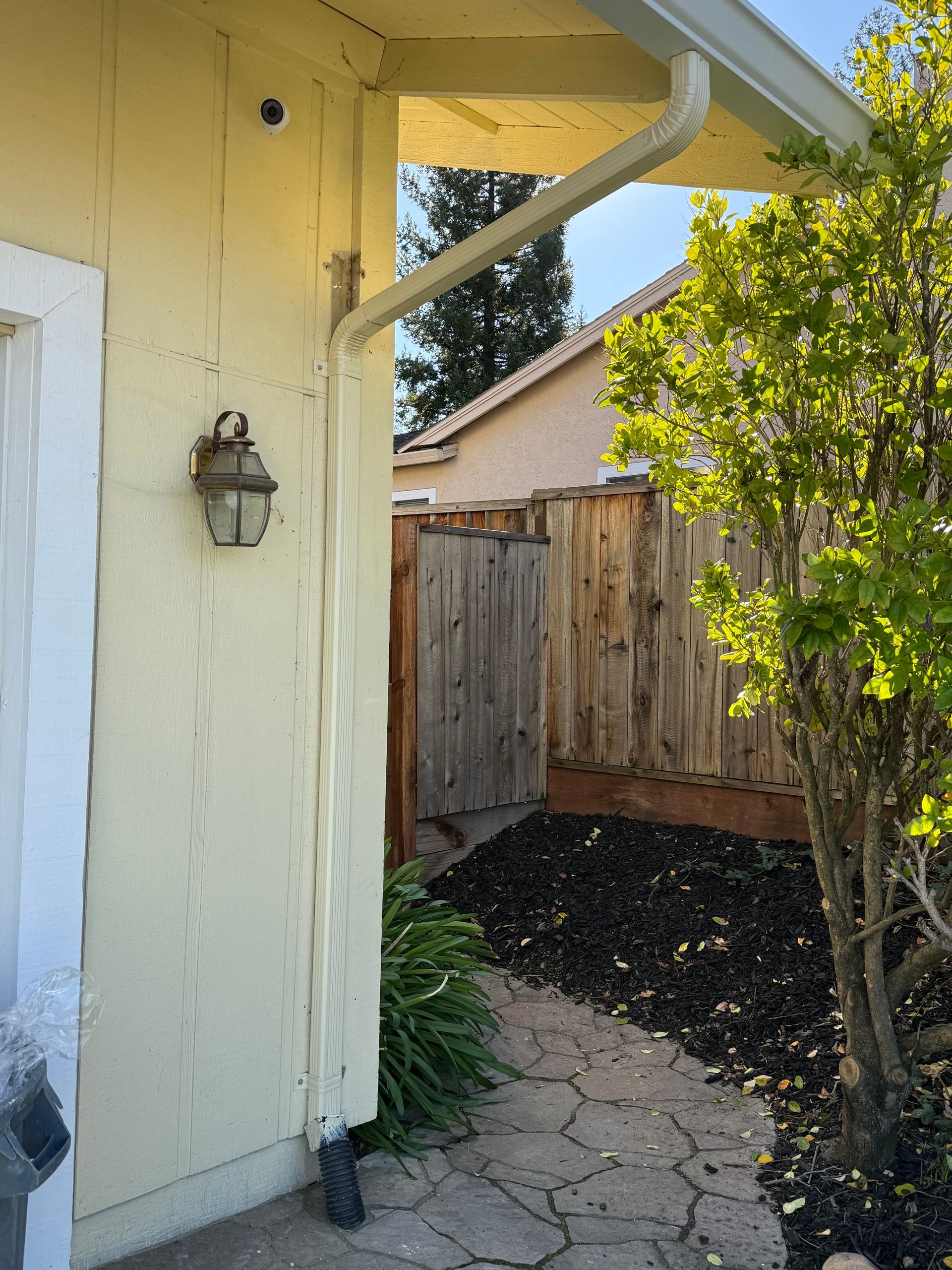 gutter and downpout installation on home