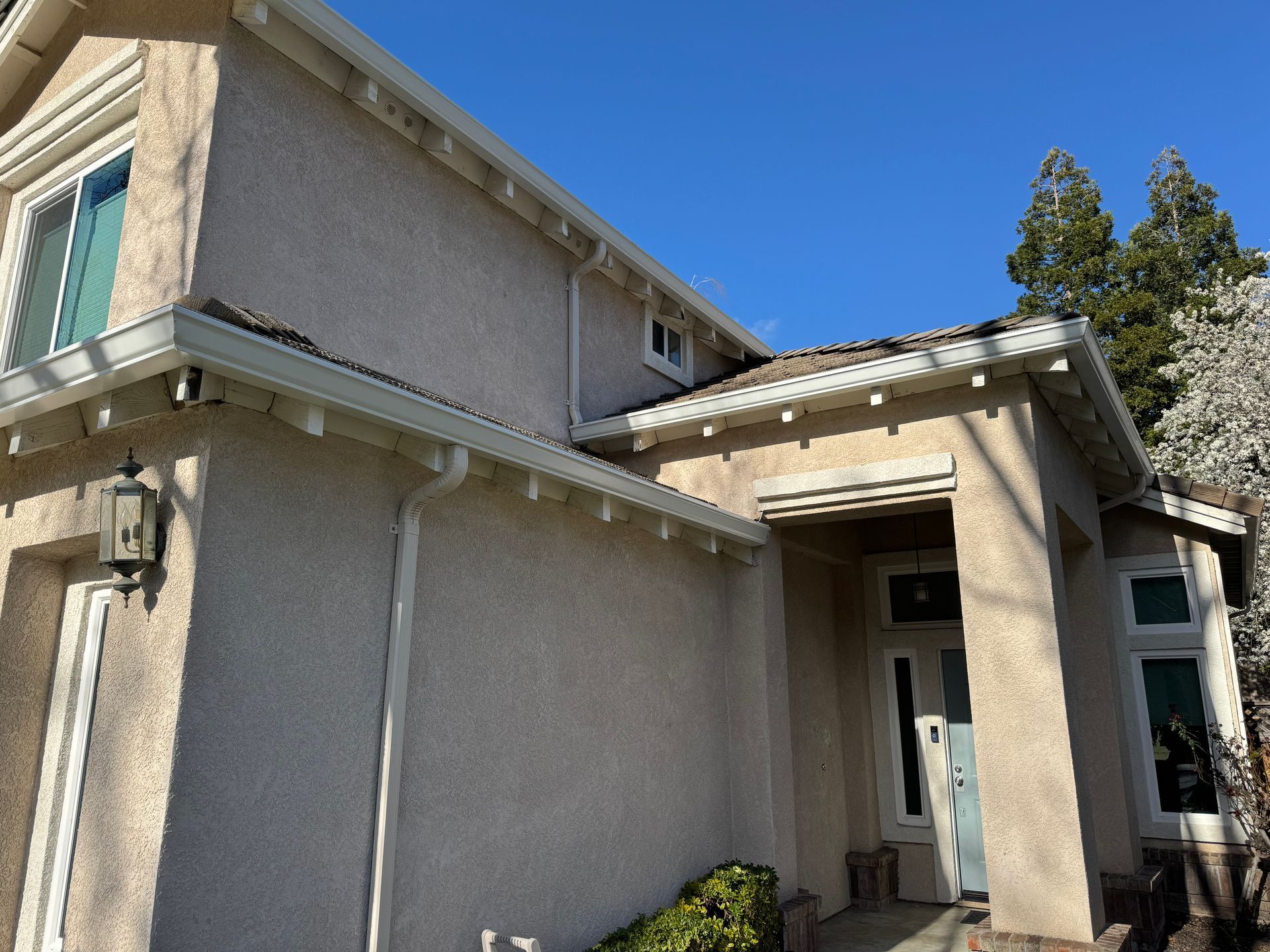 white gutters with screens