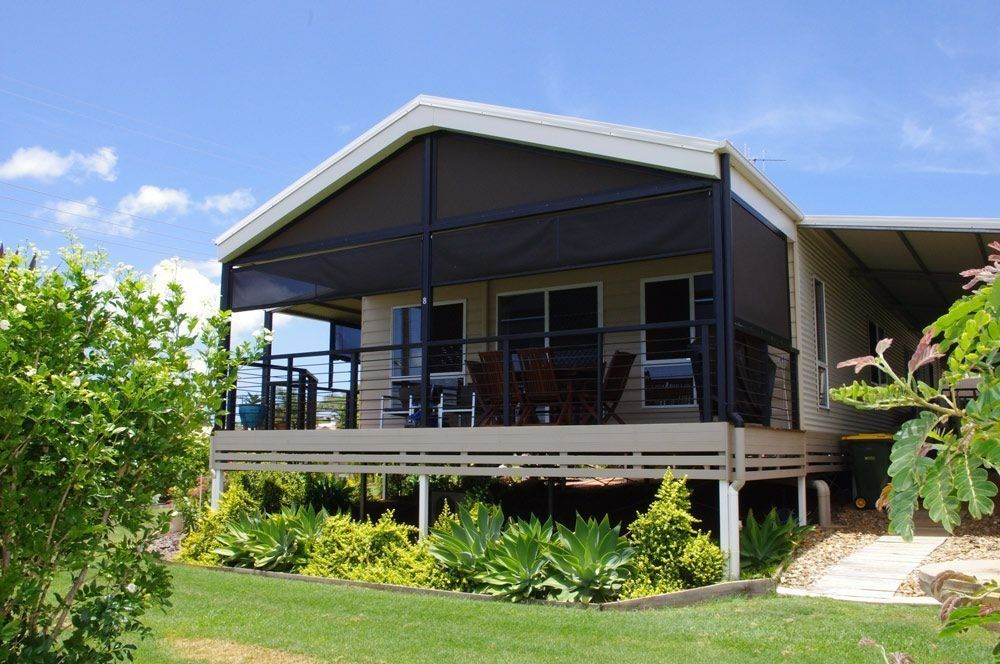A House with A Screened in Porch and A Deck — All Steel Homes in Bundaberg, QLD