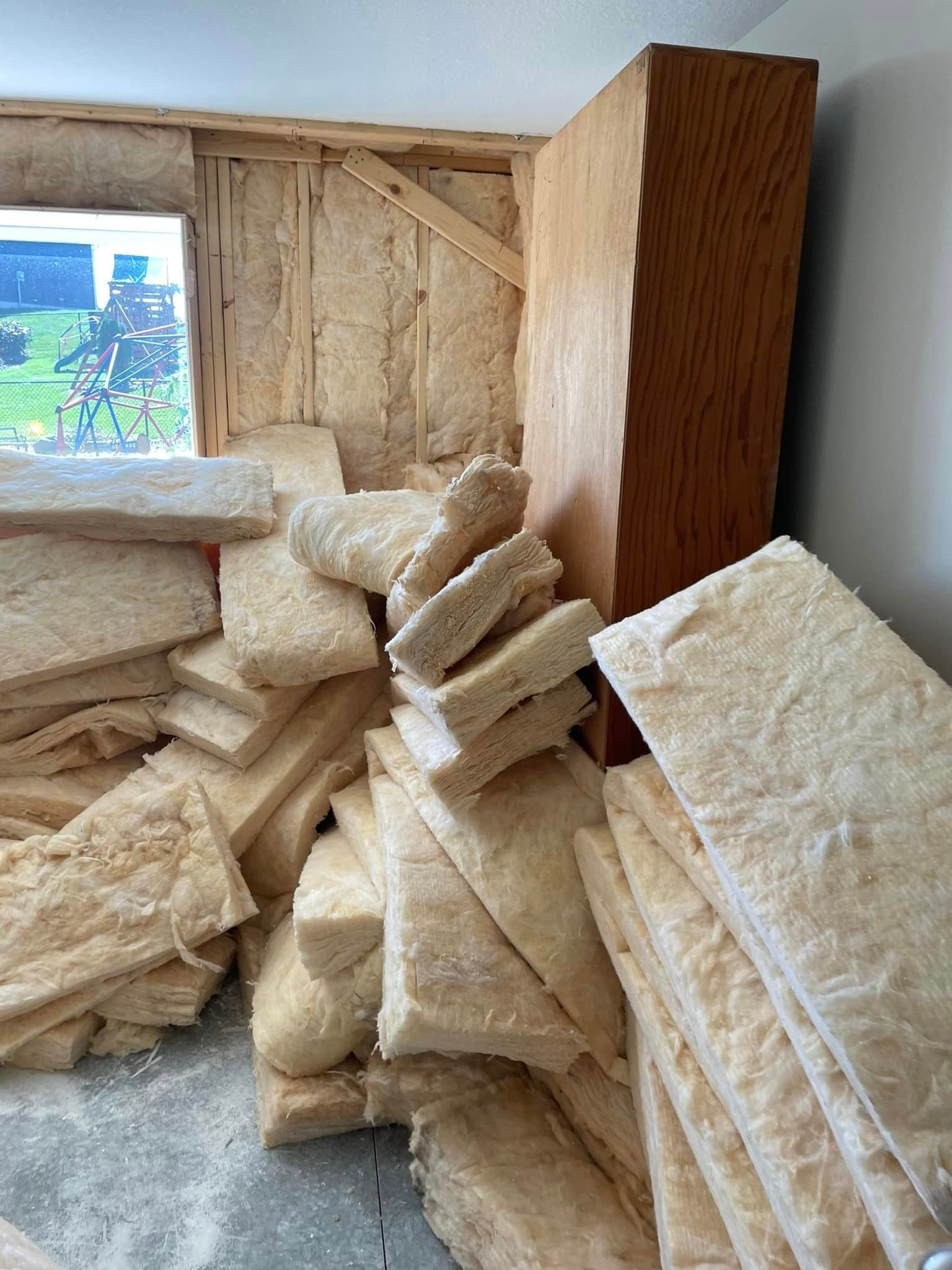 A room a pile of glass wool insulation