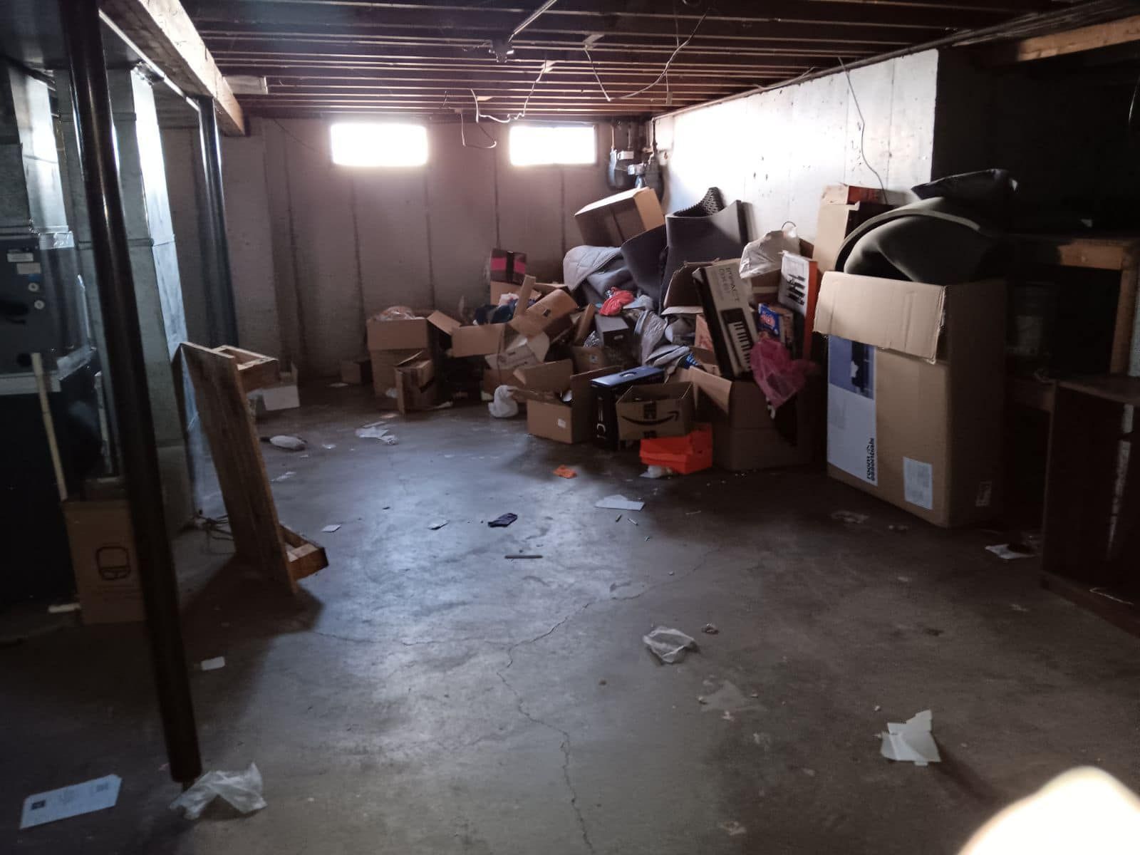 Garage filled with clutter that needs to be removed.