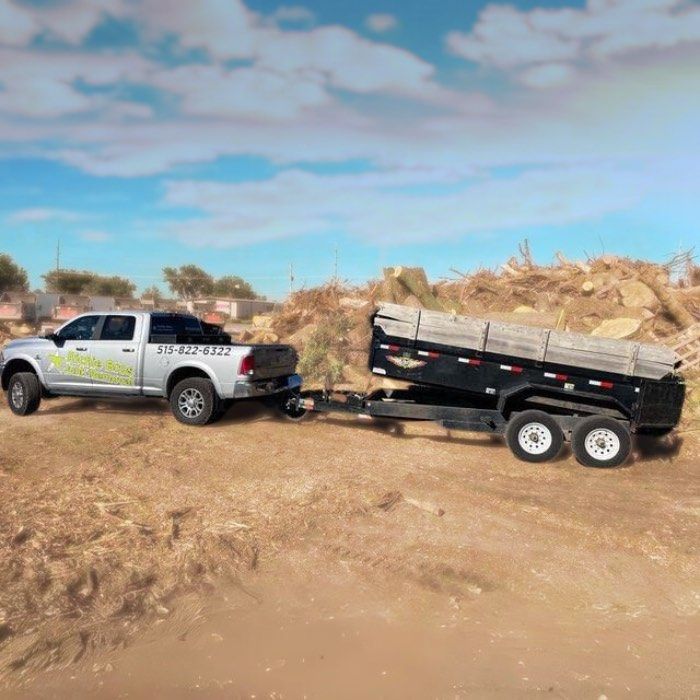 Richie Bros Junk Removal trailer driving junk to landfill