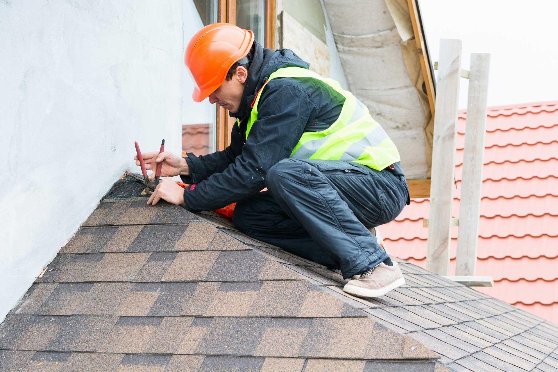Man Repairing Roof — Medford, OR — On the Top Roofing Services LLC