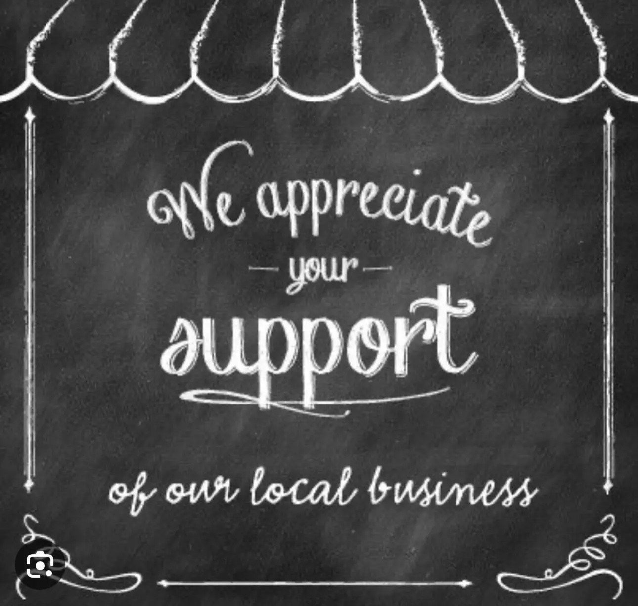 A chalkboard that says we appreciate your support of our local business