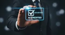 A person in a business suit holding a glowing, holographic icon with a checkmark and five stars labeled 