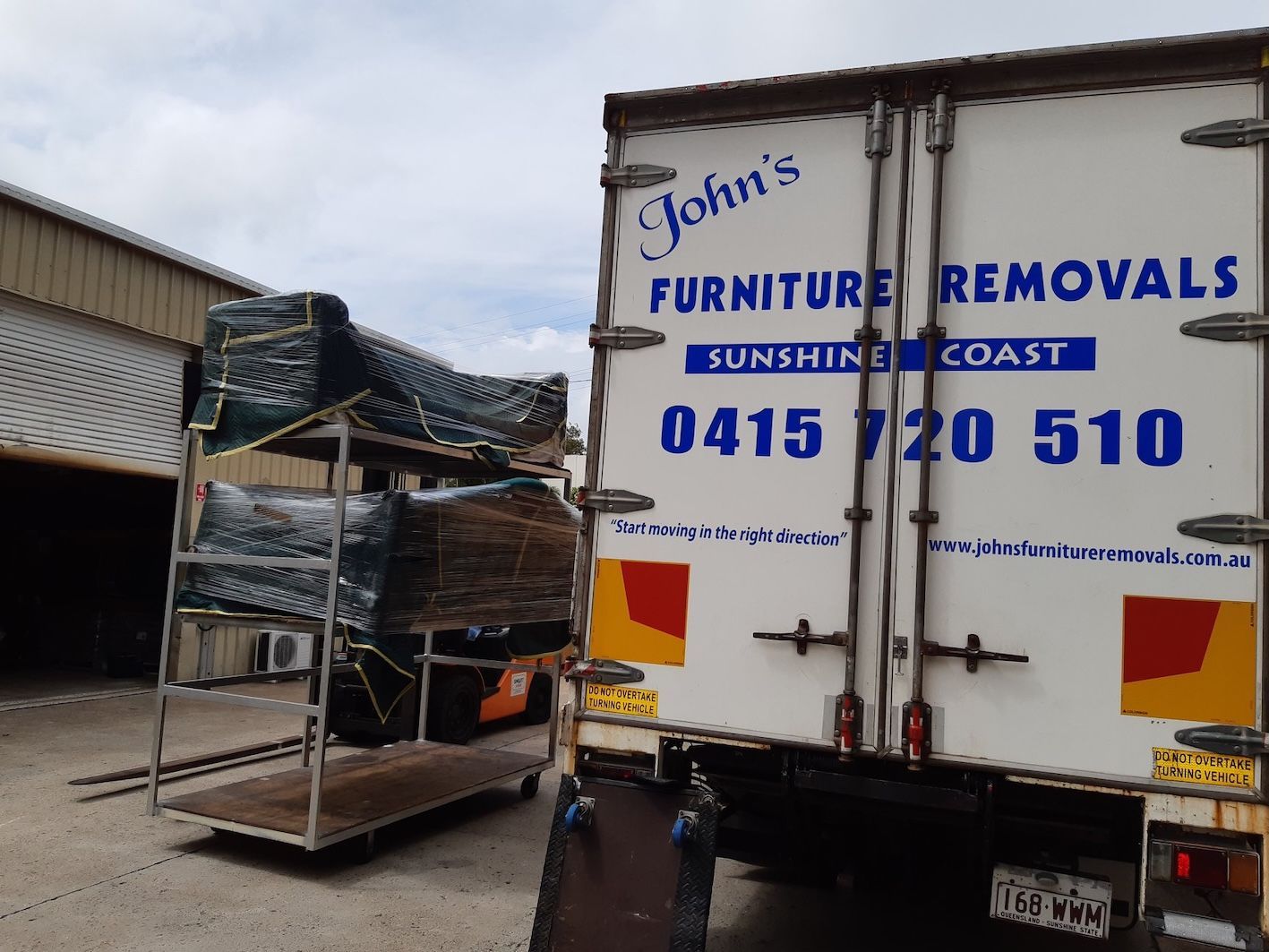 Removal Van Next To Commercial Business Garage — John's Furniture Removals in Beerwah, QLD