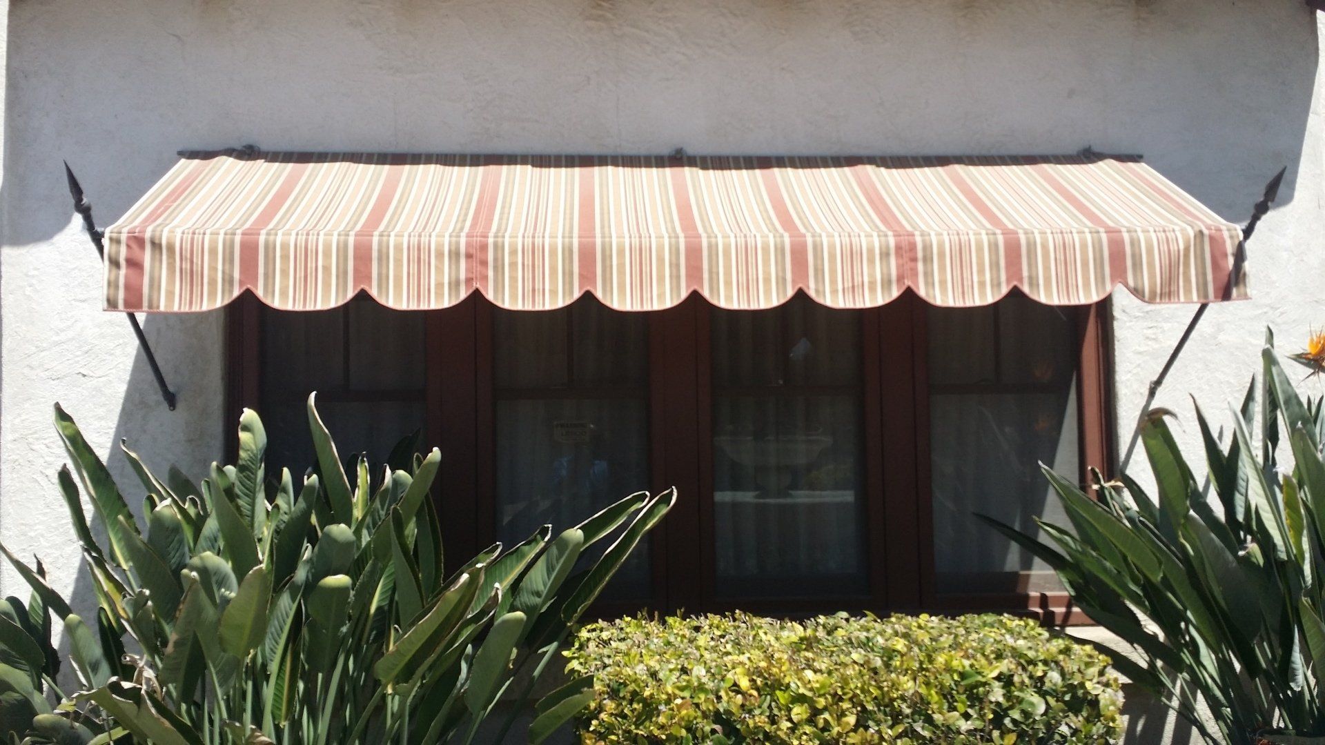Yellow Striped Awning — Awnings in Riverside, CA