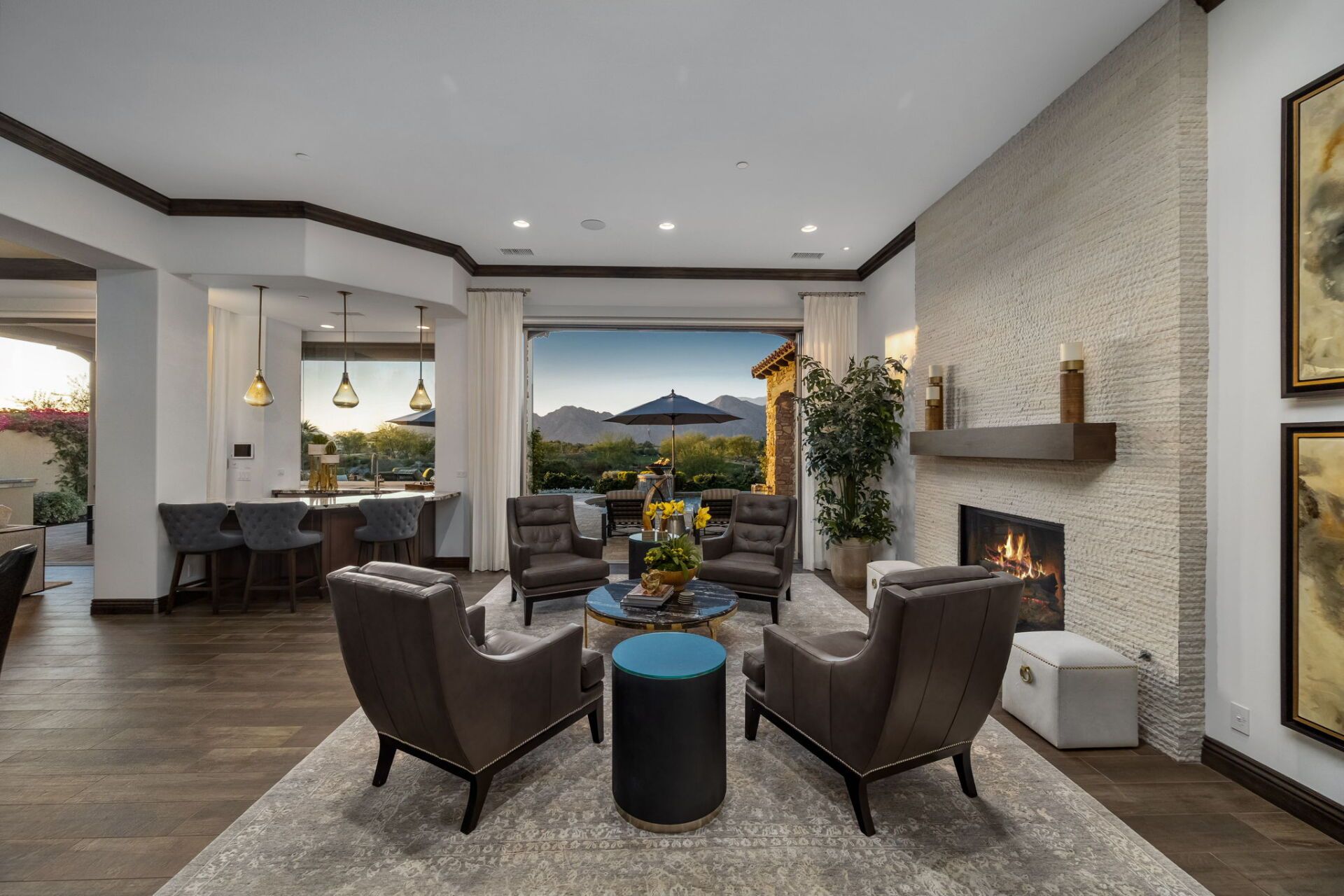 A living room filled with furniture and a fireplace.