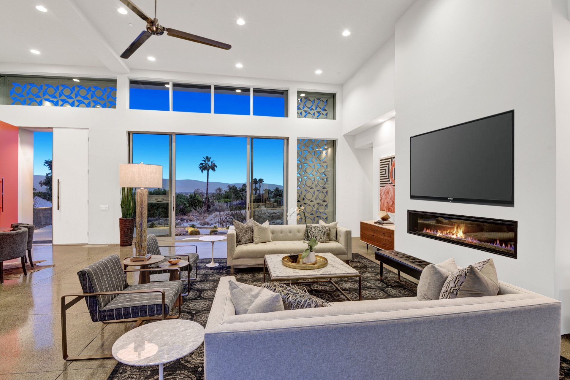 A living room filled with furniture and a flat screen tv.