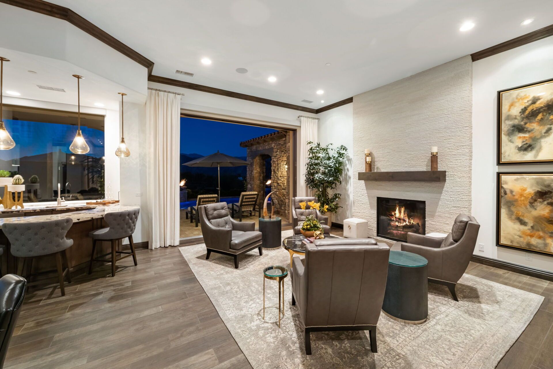 A living room filled with furniture and a fireplace.