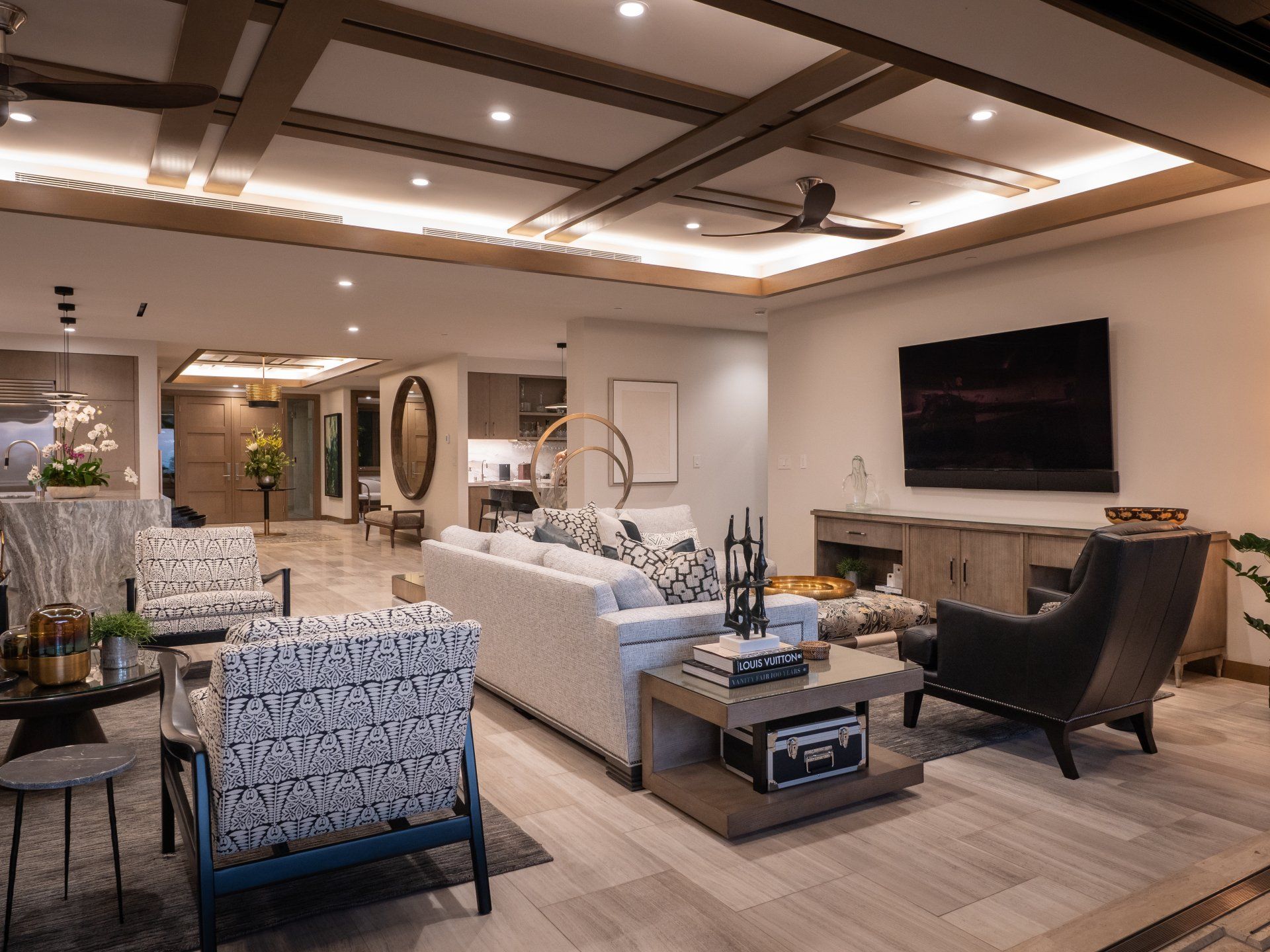 A living room filled with furniture and a flat screen tv.