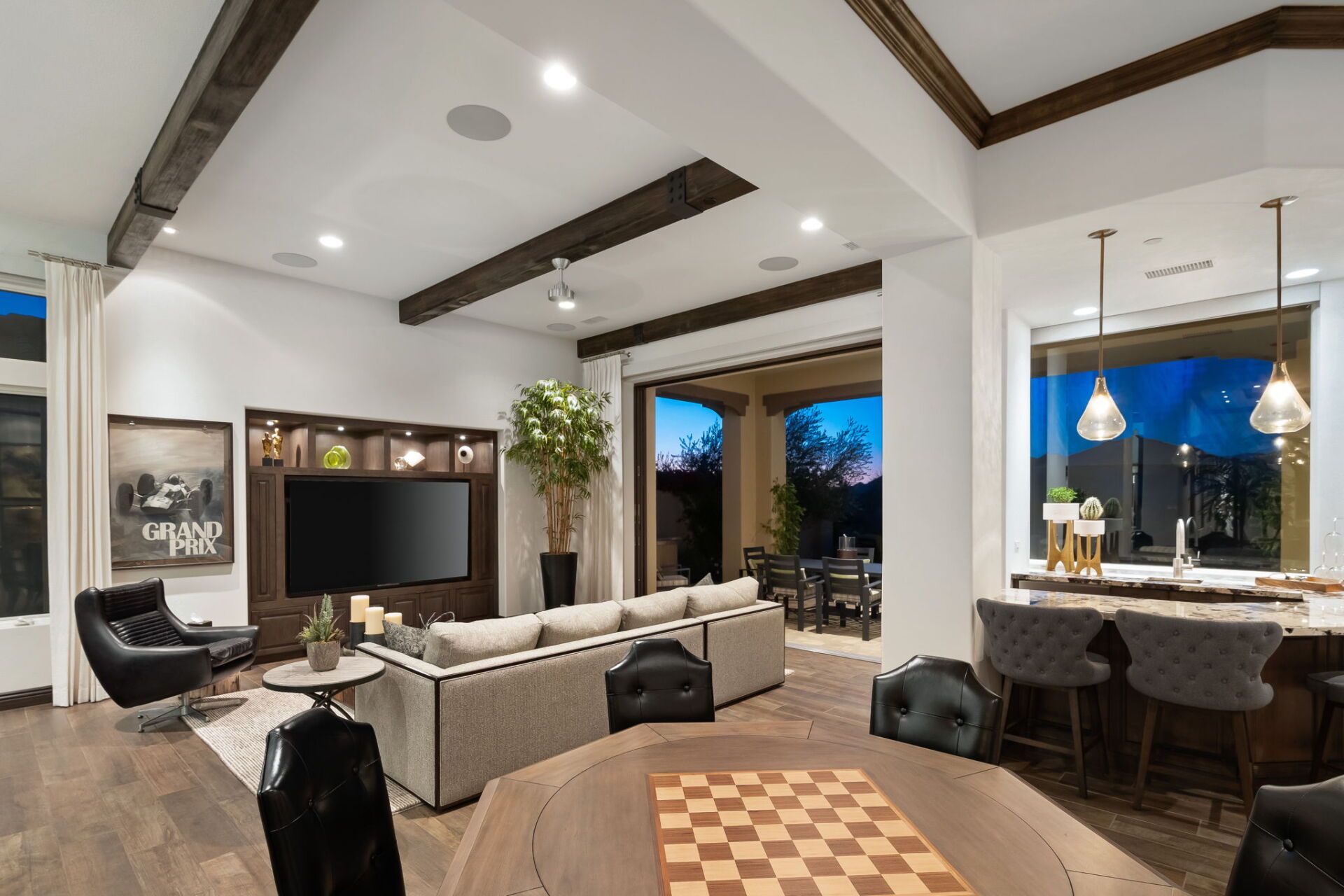 There is a chess board on the table in the living room.