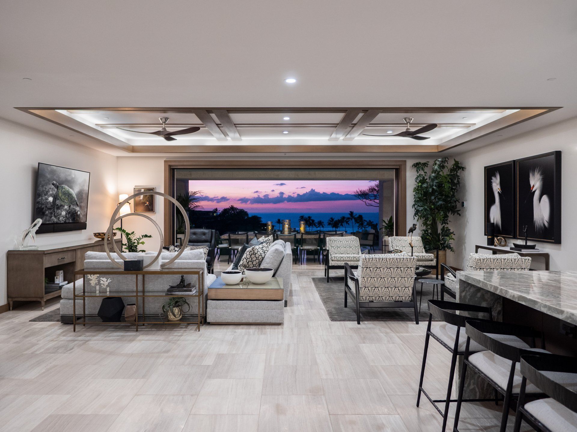 An artist 's impression of a living room with a view of the ocean.