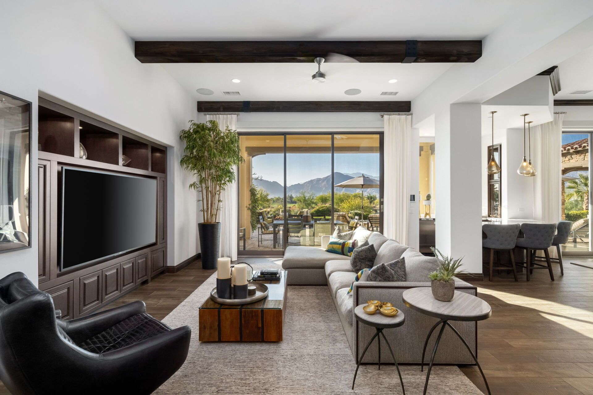 A living room filled with furniture and a flat screen tv.