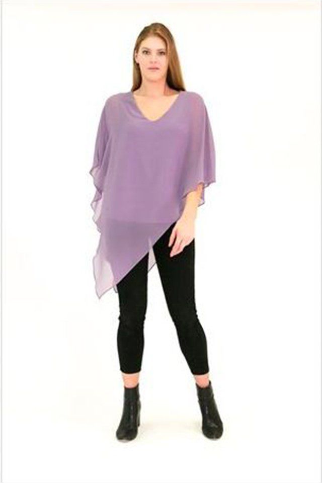 Fashionable Woman in a purple top, black pant & black boot Posing — Women’s Boutique Mid North Coast