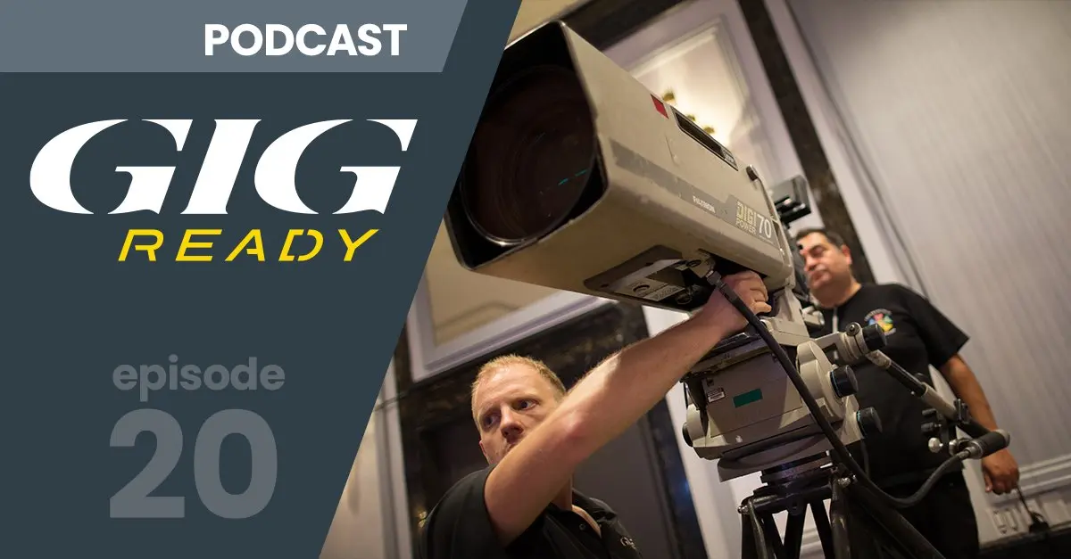 A man is fixing a camera on a podcast called gig ready