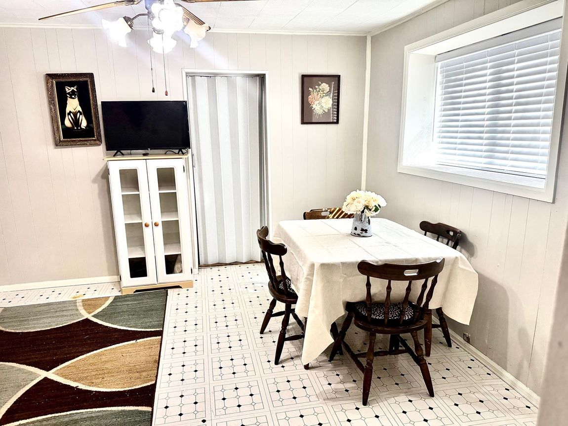 Dining area with table and chairs inside Stucco Casa vacation rental