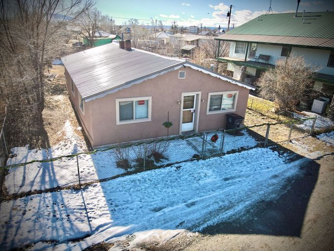 Stucco Casa vacation rental home in Antonito Colorado with fenced yard