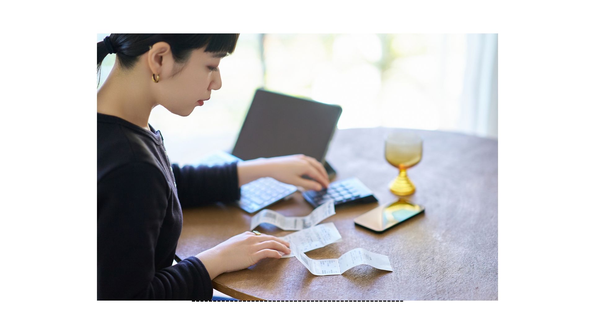 Scanning business receipts to stay organized with bookkeeping.”