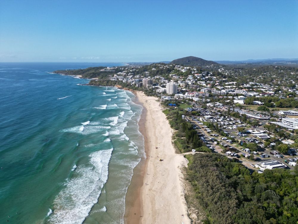 An Aerial View of Coolum Beach With a City in the Background — Construction 33 in Coolum Beach, QLD