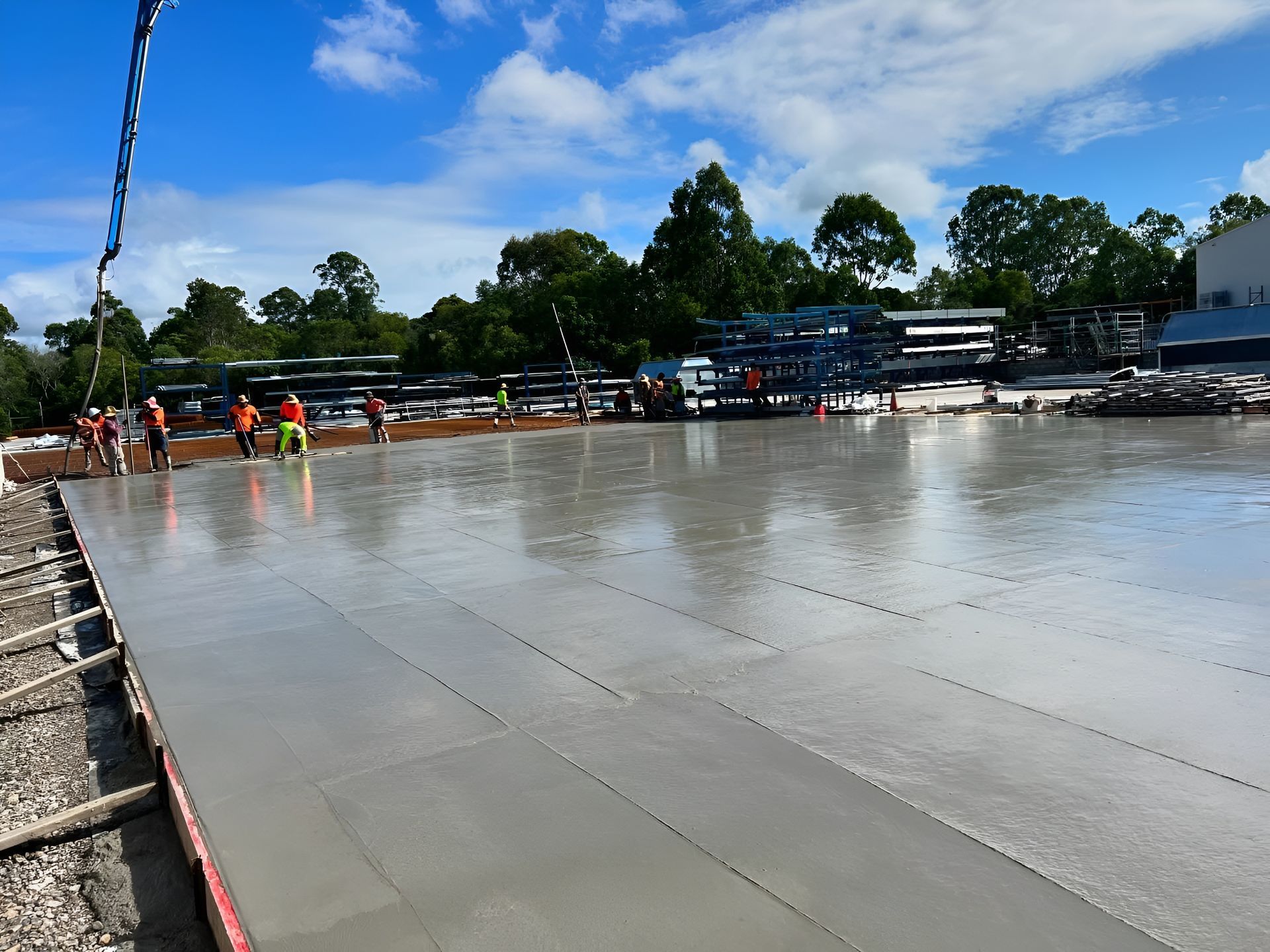 Workers Pouring and Smoothing Concrete — Construction 33 in Maroochydore, QLD