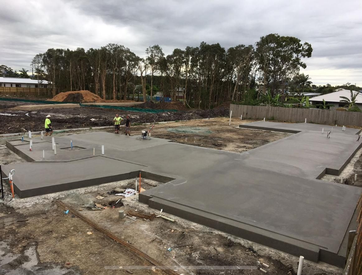 Concrete Floor is Being Poured on a Construction Site — Construction 33 in Maroochydore, QLD