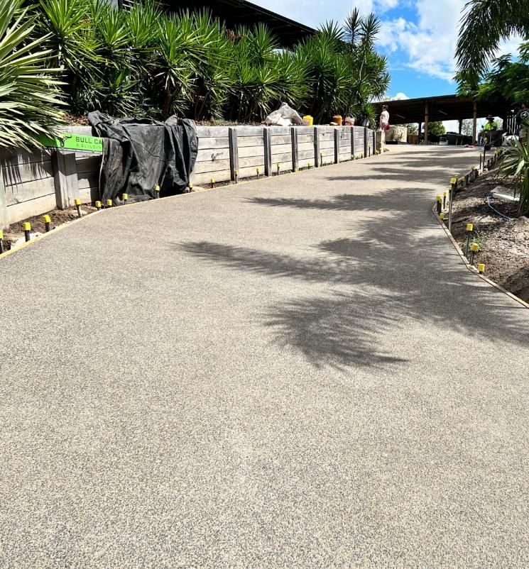 Concrete Walkway Surrounded by Palm Trees — Construction 33 in Maroochydore, QLD