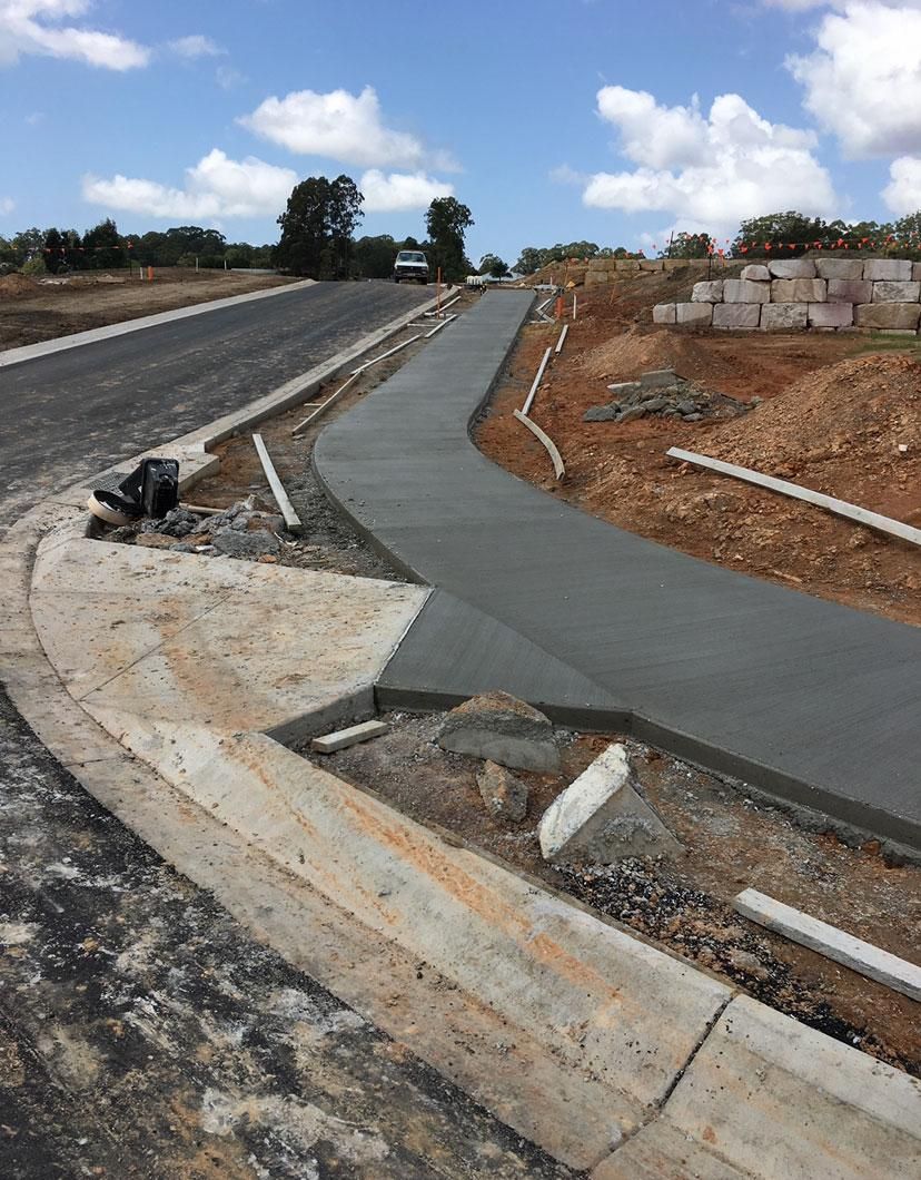 Concrete Walkway is Being Built on the Side of a Road — Construction 33 in Noosa, QLD
