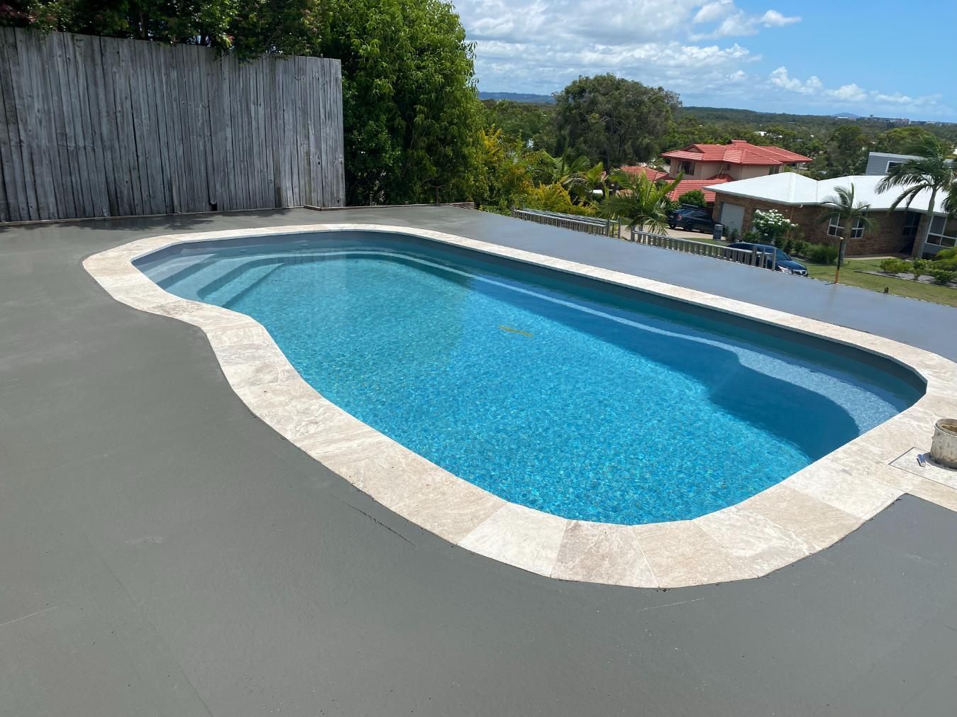 Large Swimming Pool is Sitting on Top of a Concrete Deck — Construction 33 in Maroochydore, QLD