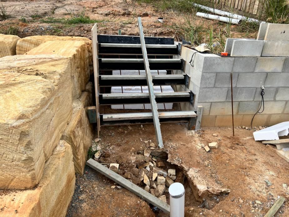 Set of Stairs Are Being Built Next to a Brick Wall — Construction 33 Concreting in Moreton Bay, QLD