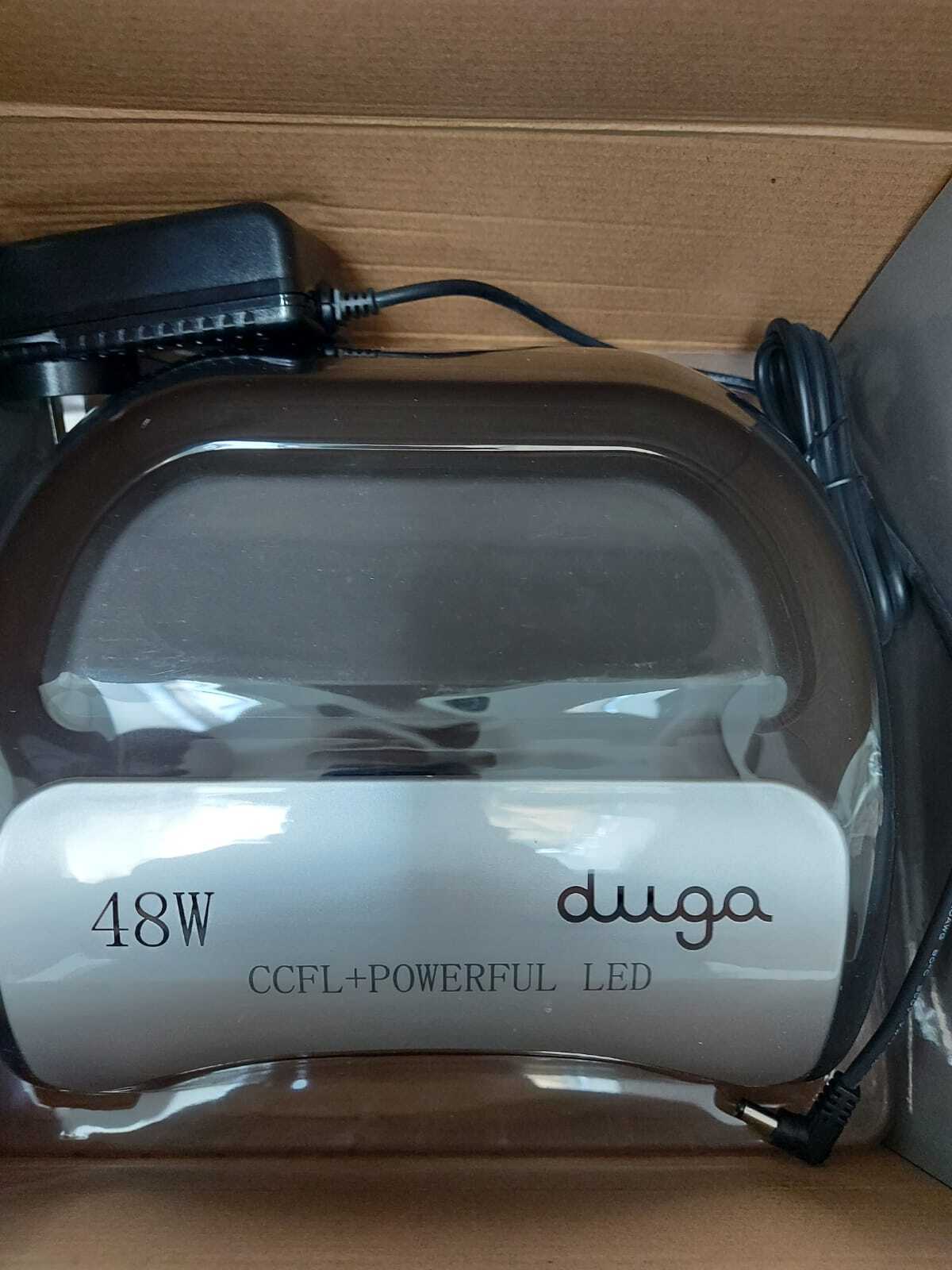 Lámpara de uñas de color marrón y blanco etiquetada como