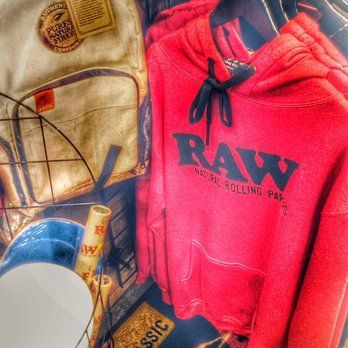 A red hoodie with the word raw on it
