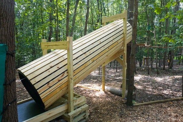 Tunnel slide on high ropes course