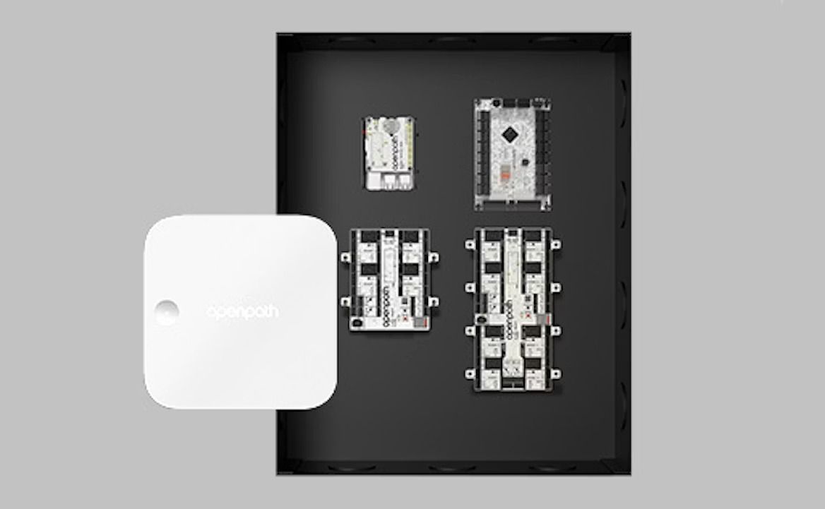 White device next to black display with electronic components.