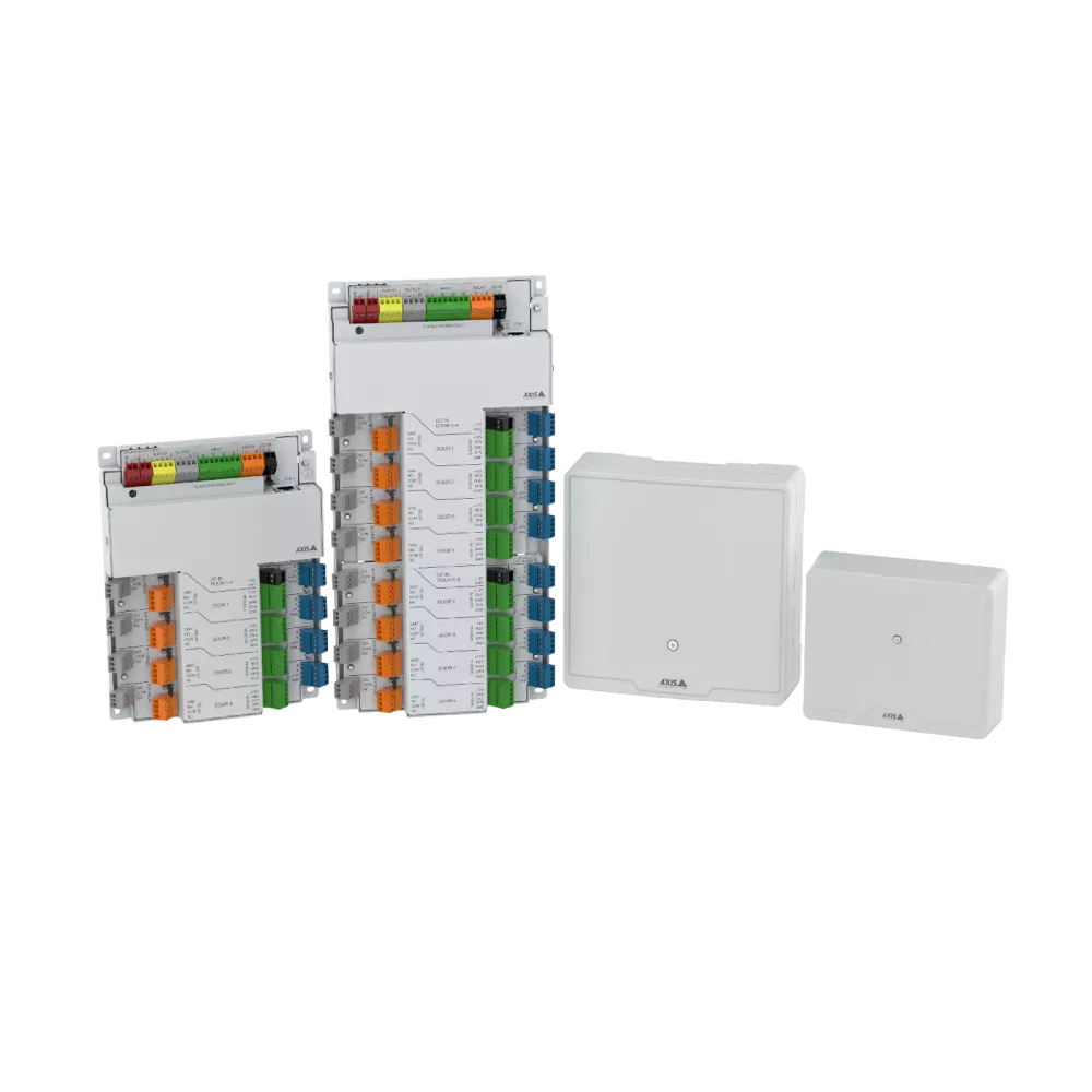 Several white electrical components, including terminal blocks and boxes.