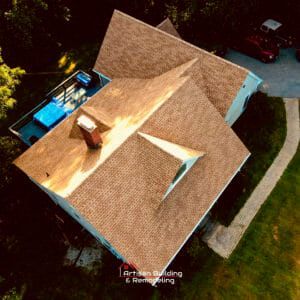 An aerial view of a house with a new roof