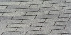 A close up of a roof with shingles on it.